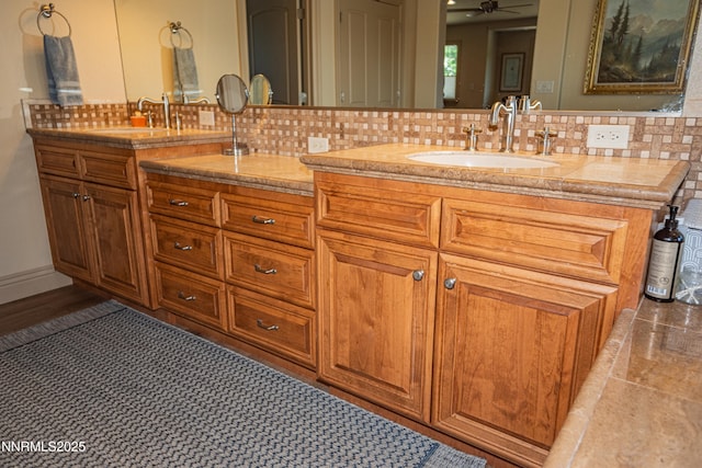 15045 Heathcliff Dr, Reno, NV 89511 - bathroom featuring double vanity, tasteful backsplash, and a ceiling fan