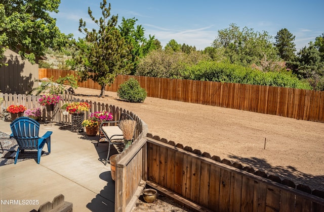15045 Heathcliff Dr, Reno, NV 89511 - fenced backyard featuring a patio