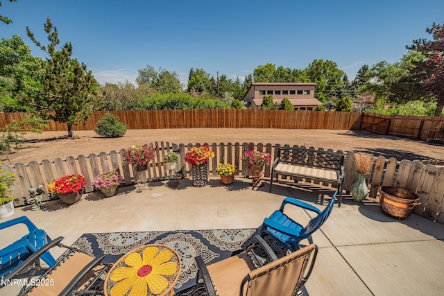 15045 Heathcliff Dr, Reno, NV 89511 - fenced backyard with a patio area