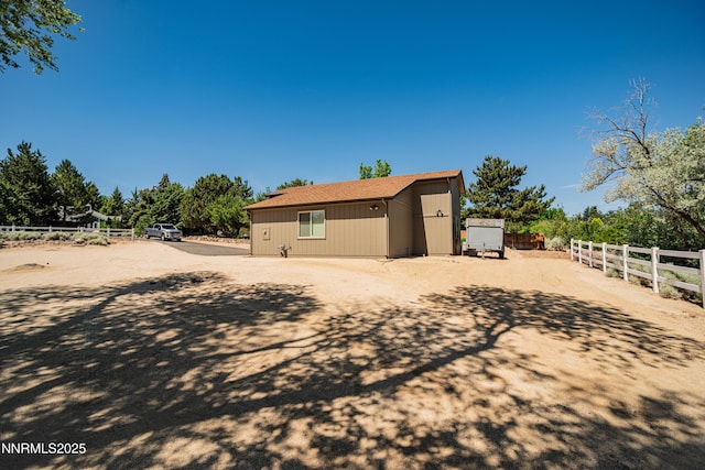 15045 Heathcliff Dr, Reno, NV 89511 - view of side of home featuring an outbuilding