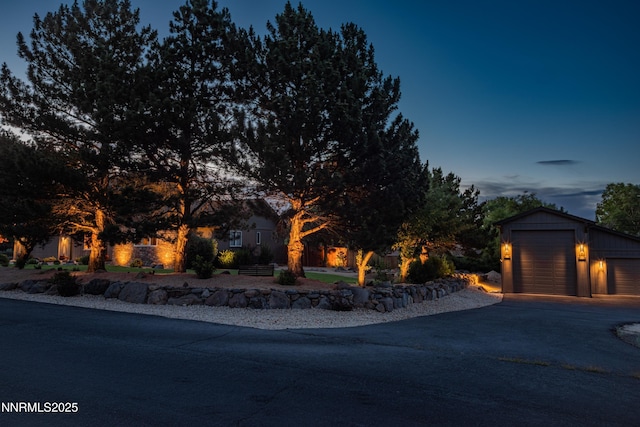 15045 Heathcliff Dr, Reno, NV 89511 - view of property hidden behind natural elements with an outbuilding and a detached garage