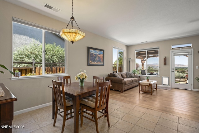 3226 Banestone Rd, Sparks, NV 89436 - dining area with light tile patterned floors and baseboards