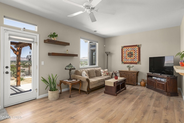 3226 Banestone Rd, Sparks, NV 89436 - living room with light wood-style floors and ceiling fan