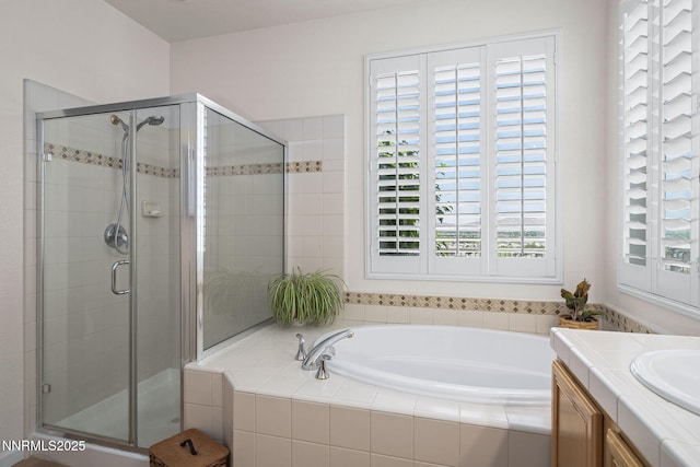 3226 Banestone Rd, Sparks, NV 89436 - full bathroom featuring a garden tub, a stall shower, and vanity