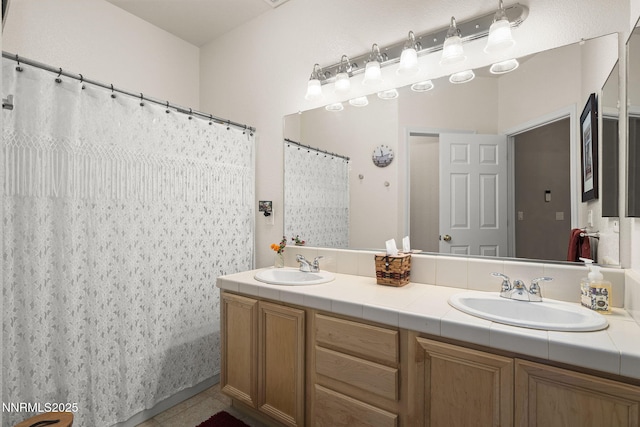 3226 Banestone Rd, Sparks, NV 89436 - full bath featuring double vanity, curtained shower, and tile patterned floors