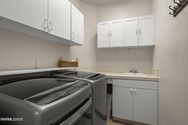 3226 Banestone Rd, Sparks, NV 89436 - laundry area with cabinet space and washing machine and dryer