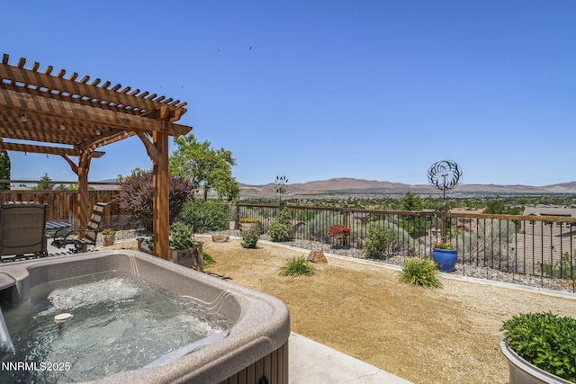 3226 Banestone Rd, Sparks, NV 89436 - fenced backyard featuring a hot tub, a mountain view, and a pergola