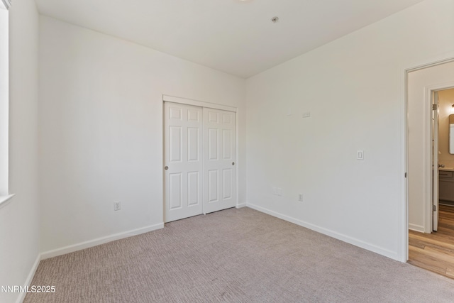 6120 Ingleston Dr Unit 621, Sparks, NV 89436 - unfurnished bedroom featuring light carpet and a closet