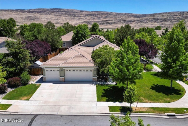 6648 Equation Dr, Sparks, NV 89436 - aerial view of property and surrounding area with a mountainous background