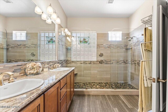 6648 Equation Dr, Sparks, NV 89436 - bathroom with double vanity and a walk in shower