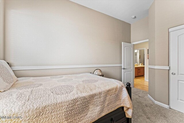 6648 Equation Dr, Sparks, NV 89436 - bedroom with light carpet and baseboards