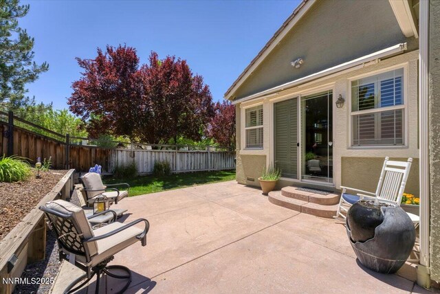 6648 Equation Dr, Sparks, NV 89436 - fenced backyard featuring a patio area