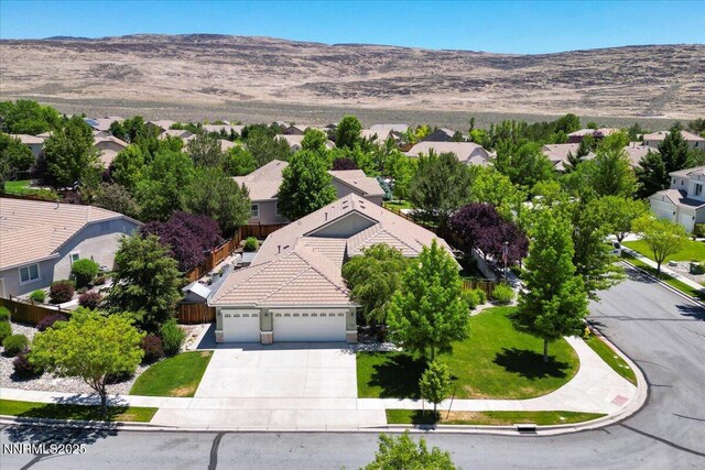 6648 Equation Dr, Sparks, NV 89436 - aerial view of residential area featuring mountains