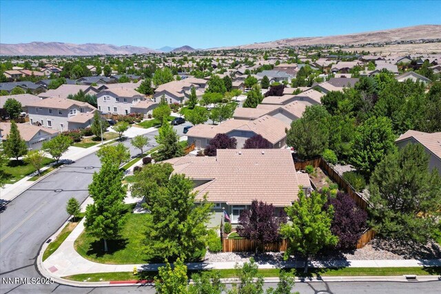 6648 Equation Dr, Sparks, NV 89436 - aerial perspective of suburban area with mountains