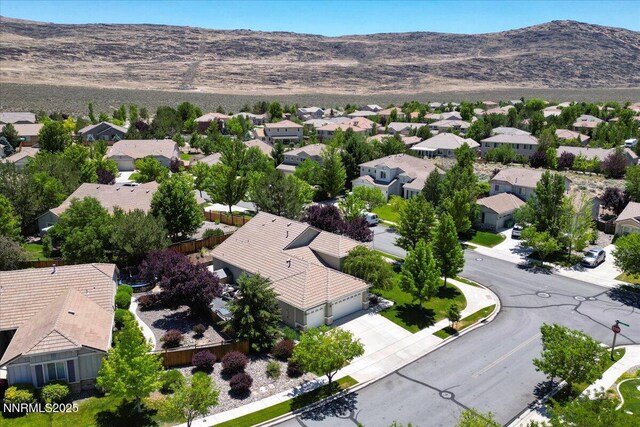 6648 Equation Dr, Sparks, NV 89436 - aerial perspective of suburban area with a mountain backdrop