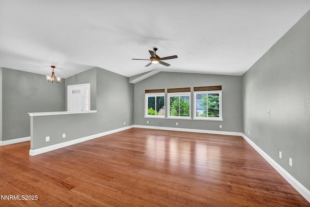 2159 Shadow Brook Ct, Carson City, NV 89703 - spare room with a chandelier, lofted ceiling, ceiling fan, and wood finished floors