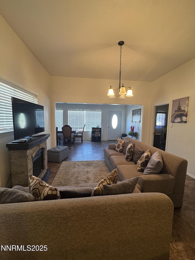 468 S Maine St, Fallon, NV 89406 - living room featuring a chandelier, a fireplace, and lofted ceiling