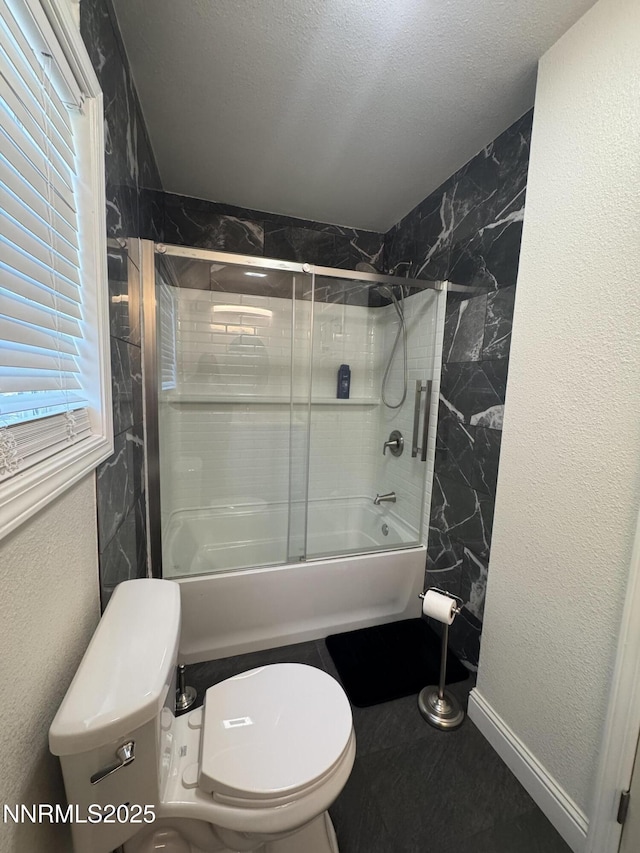 468 S Maine St, Fallon, NV 89406 - full bathroom with shower / bath combination with glass door, tile patterned flooring, a textured wall, and a textured ceiling