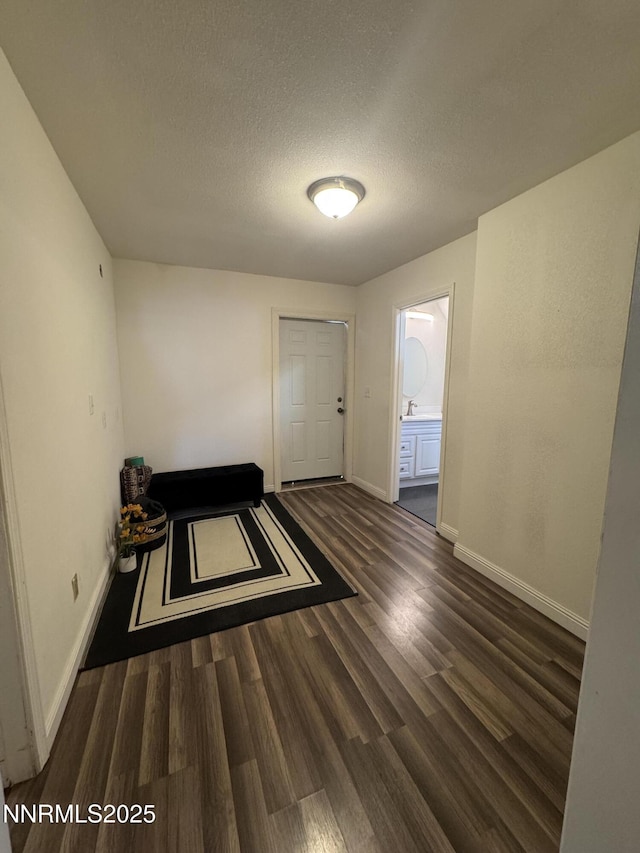 468 S Maine St, Fallon, NV 89406 - empty room featuring wood finished floors and a textured ceiling