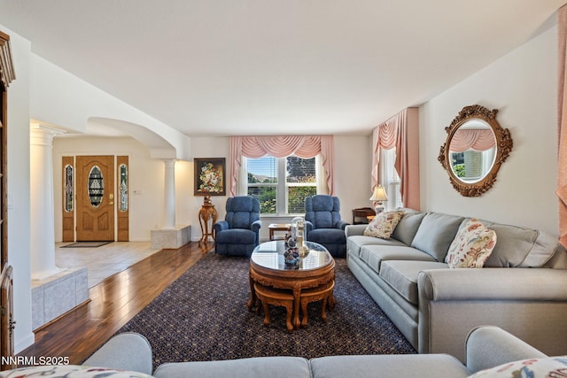 3555 Vista Blvd, Sparks, NV 89436 - living area featuring ornate columns, hardwood / wood-style floors, and arched walkways