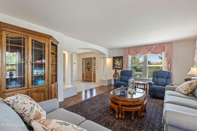 3555 Vista Blvd, Sparks, NV 89436 - living room with decorative columns, arched walkways, and wood finished floors