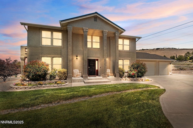 3555 Vista Blvd, Sparks, NV 89436 - view of front of house with stucco siding, a garage, and a front lawn