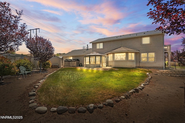 3555 Vista Blvd, Sparks, NV 89436 - rear view of property featuring a gazebo, a fenced backyard, and stucco siding