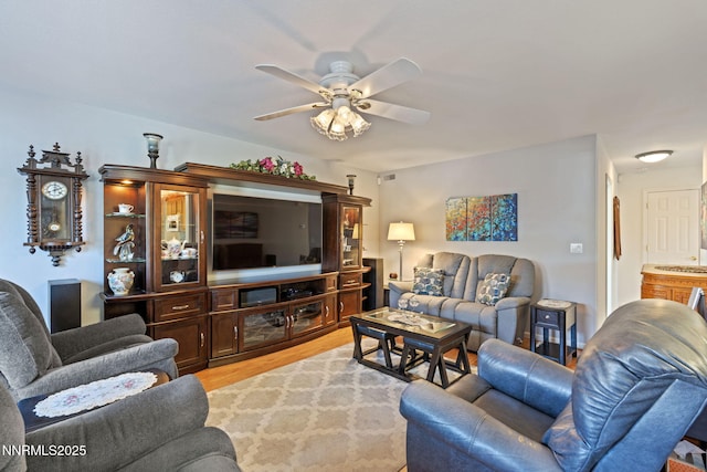 3555 Vista Blvd, Sparks, NV 89436 - living room with a ceiling fan and light wood-type flooring