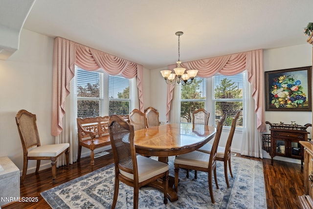 3555 Vista Blvd, Sparks, NV 89436 - dining area featuring a chandelier and dark wood-style floors