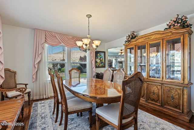 3555 Vista Blvd, Sparks, NV 89436 - dining area with a chandelier and wood finished floors