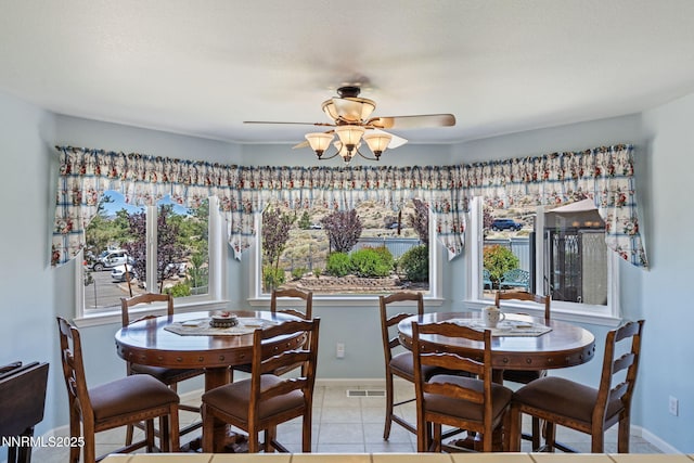 3555 Vista Blvd, Sparks, NV 89436 - dining room featuring a ceiling fan and light tile patterned floors