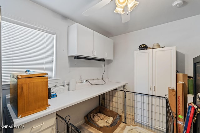 3555 Vista Blvd, Sparks, NV 89436 - kitchen with white cabinets, a ceiling fan, and light countertops