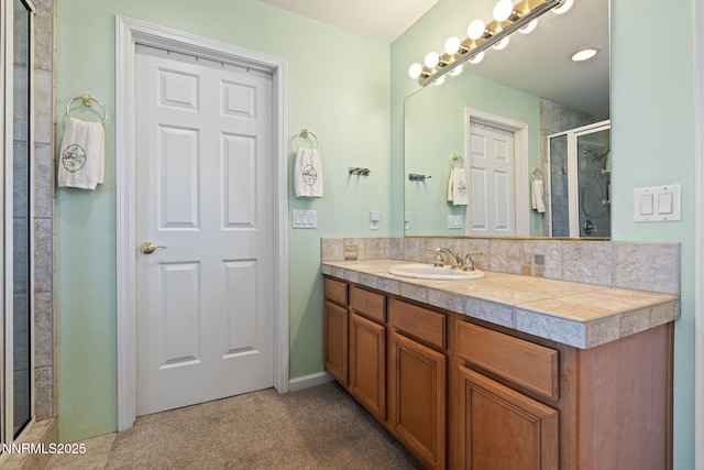 3555 Vista Blvd, Sparks, NV 89436 - full bathroom featuring a stall shower, vanity, and decorative backsplash