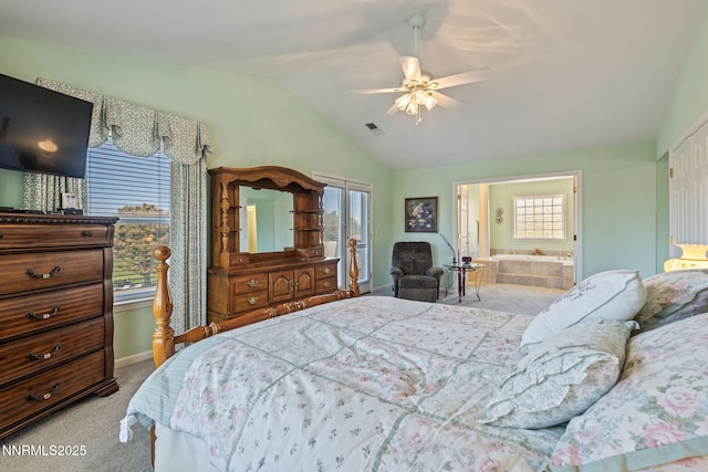 3555 Vista Blvd, Sparks, NV 89436 - carpeted bedroom with vaulted ceiling, multiple windows, connected bathroom, and a ceiling fan