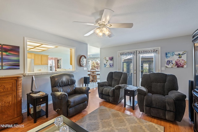 3555 Vista Blvd, Sparks, NV 89436 - living room with french doors, wood finished floors, and a ceiling fan