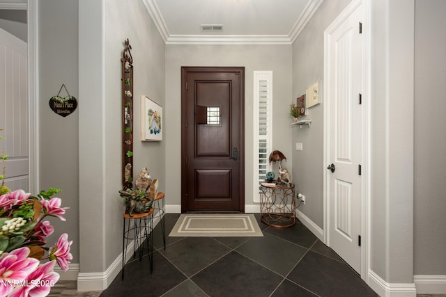 2092 Canterbury Ln, Carson City, NV 89703 - foyer entrance with dark tile patterned floors and ornamental molding