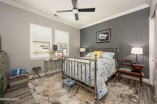 2092 Canterbury Ln, Carson City, NV 89703 - bedroom featuring crown molding, wood finished floors, and ceiling fan