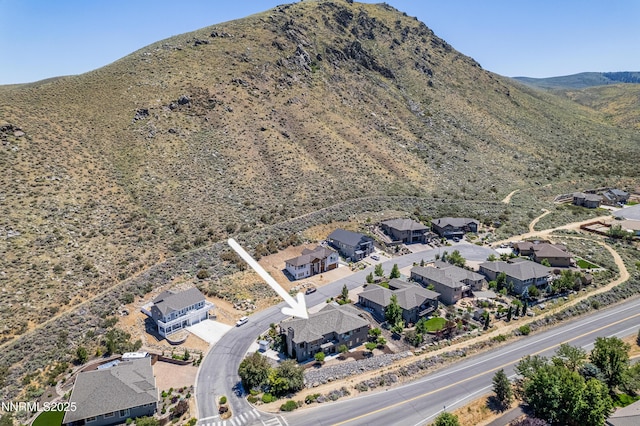 2092 Canterbury Ln, Carson City, NV 89703 - aerial view of property's location featuring a mountain backdrop and nearby suburban area