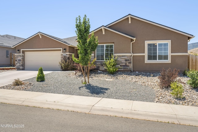 6496 Arc Dome Dr, Carson City, NV 89701 - single story home featuring stucco siding, stone siding, a garage, and driveway