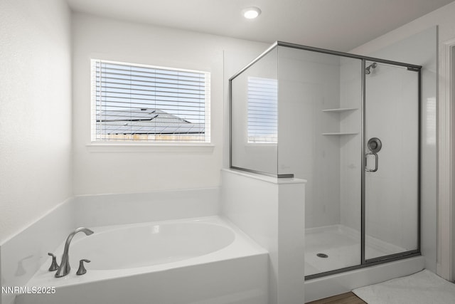 6496 Arc Dome Dr, Carson City, NV 89701 - full bathroom with a garden tub, a shower stall, and healthy amount of natural light