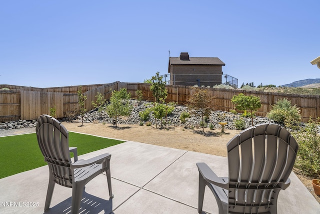 6496 Arc Dome Dr, Carson City, NV 89701 - fenced backyard with a patio