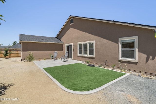 6496 Arc Dome Dr, Carson City, NV 89701 - back of house featuring a patio area and stucco siding