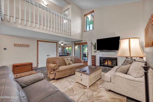 6437 Meadow Valley Ln, Reno, NV 89519 - living area with a glass covered fireplace and a high ceiling