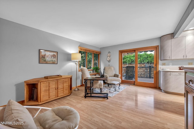 6437 Meadow Valley Ln, Reno, NV 89519 - living area with light wood-type flooring and baseboards