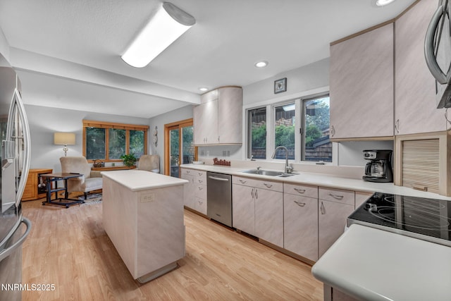 6437 Meadow Valley Ln, Reno, NV 89519 - kitchen with appliances with stainless steel finishes, light wood-style flooring, light countertops, and recessed lighting