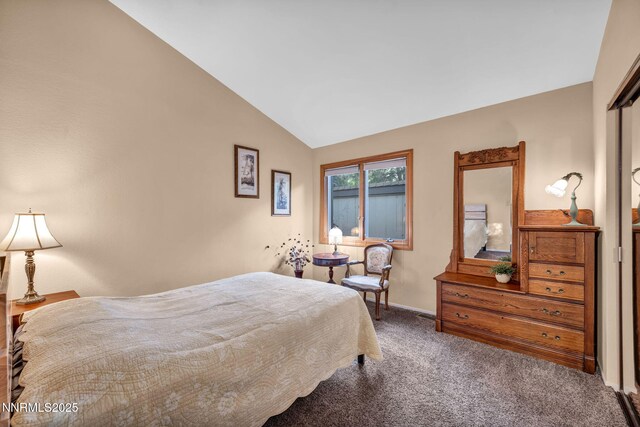 6437 Meadow Valley Ln, Reno, NV 89519 - bedroom featuring carpet flooring and lofted ceiling