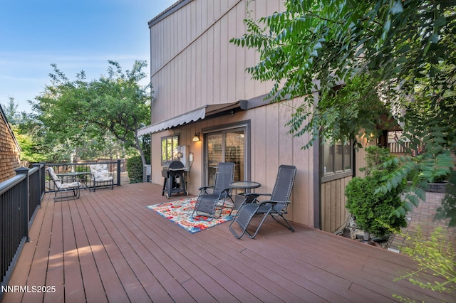 6437 Meadow Valley Ln, Reno, NV 89519 - wooden terrace featuring area for grilling and outdoor dining space