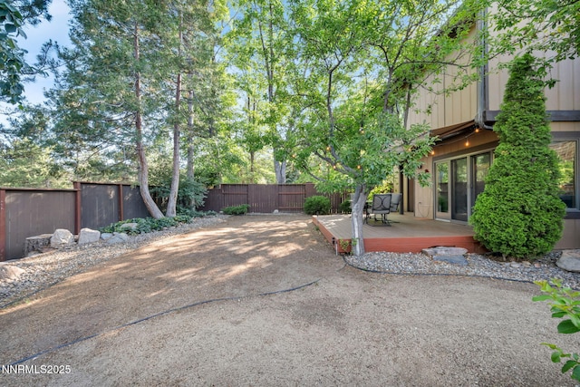 6437 Meadow Valley Ln, Reno, NV 89519 - fenced backyard featuring a wooden deck