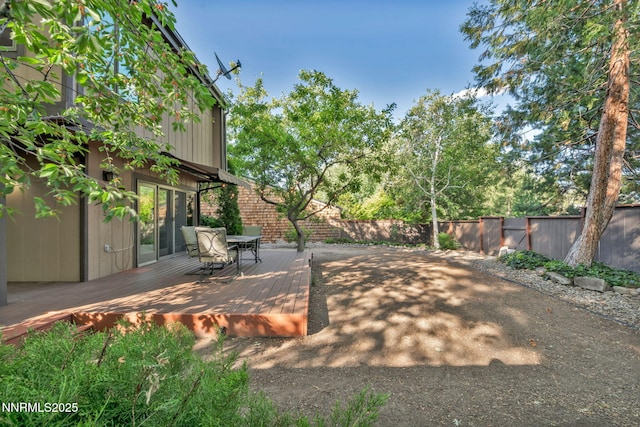 6437 Meadow Valley Ln, Reno, NV 89519 - fenced backyard featuring a deck