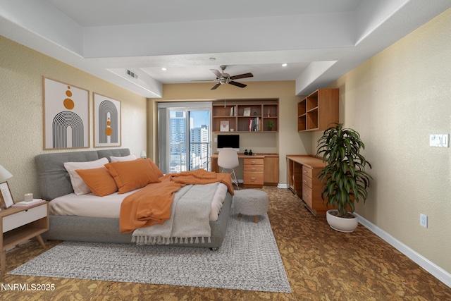 200 W 2nd St Apt 1501, Reno, NV 89501 - bedroom with built in desk, a textured wall, a ceiling fan, and recessed lighting